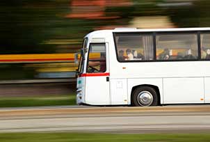 Bus Driver Gets Hired by Bus Company After DUI, Speeds Through Red Light Causing 3 Deaths