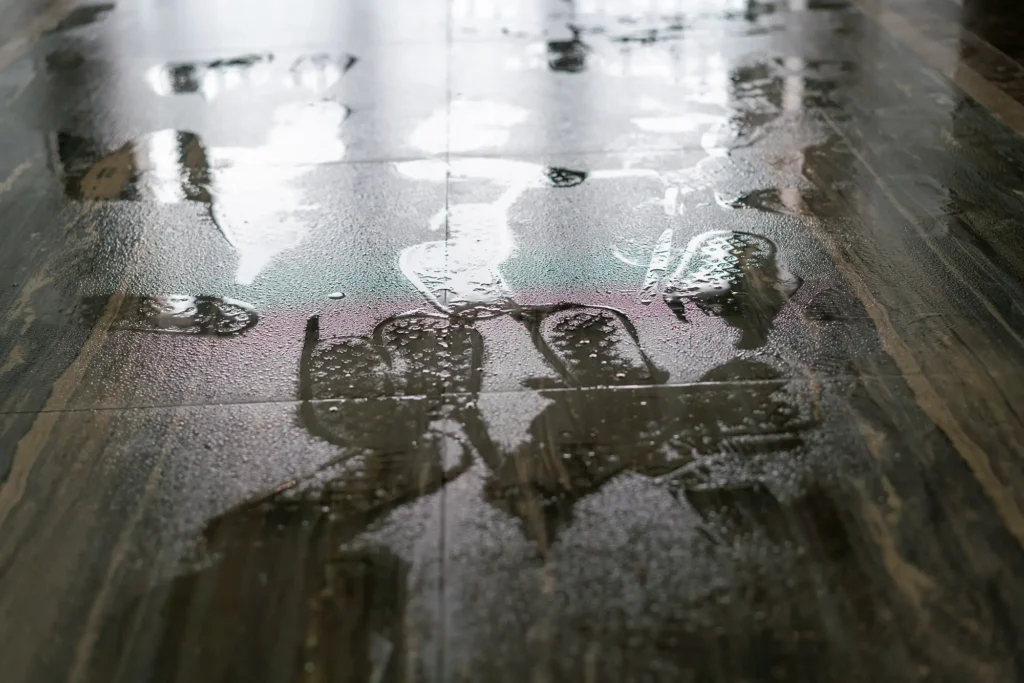 Wet slippery floor with footprints, a common cause of slip-and-fall accidents